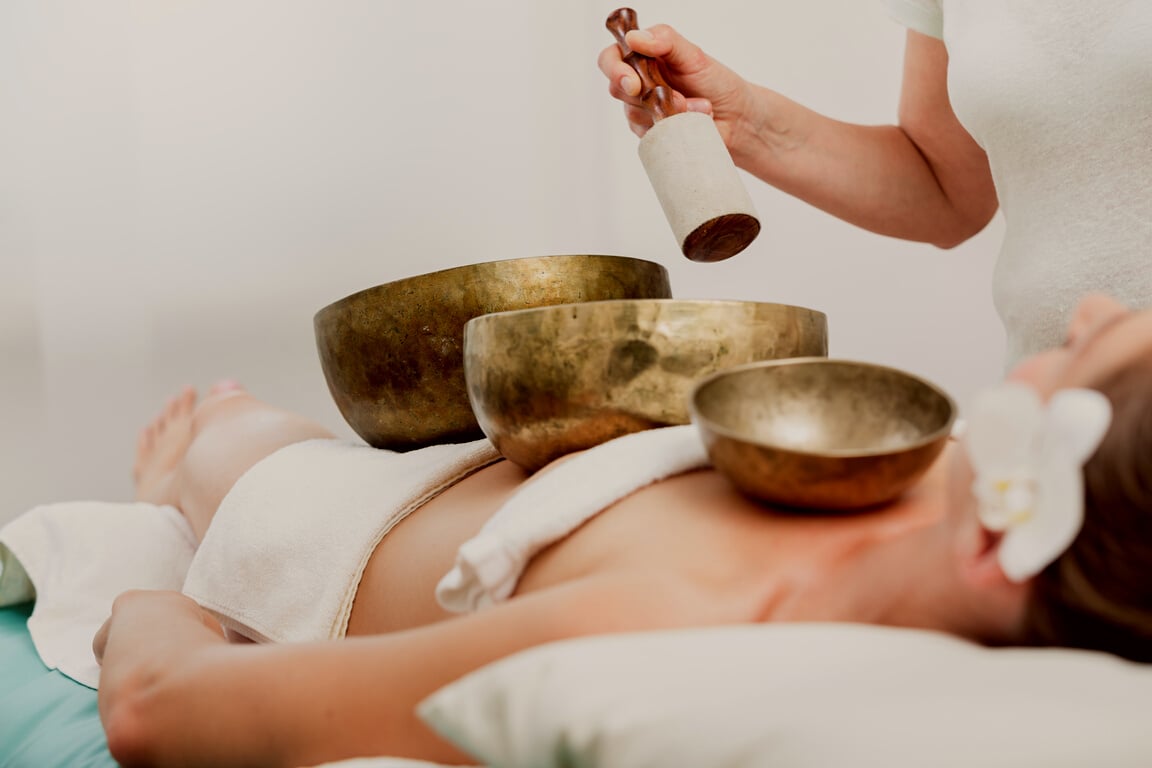 Woman Relaxing with Singing Bowl