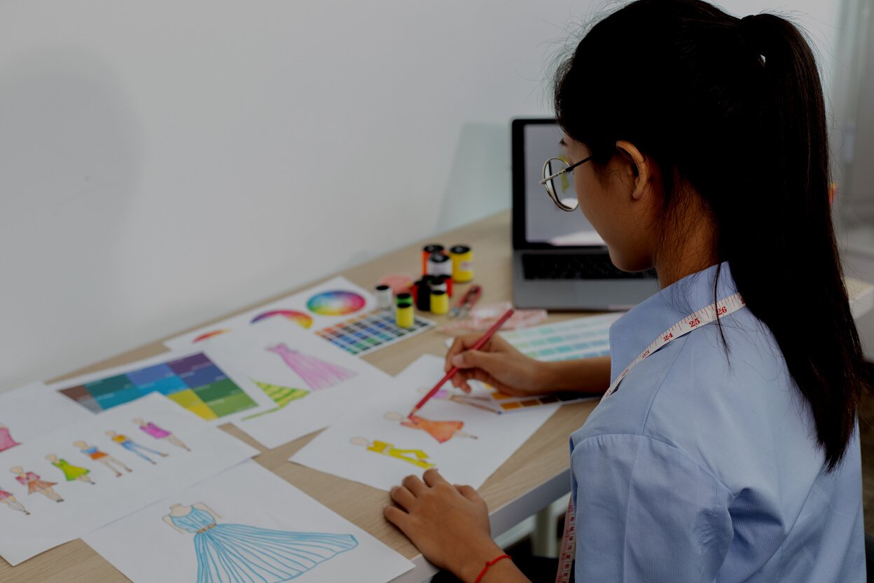Young Designer Creating New Style of Clothing 